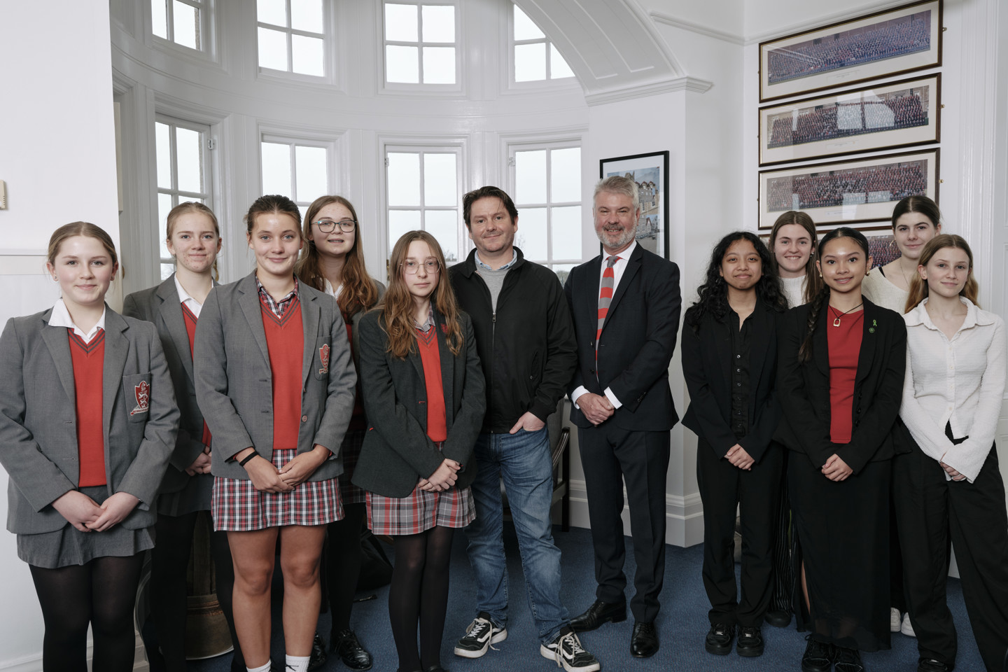 James Pountney, CEO of Santander International with JCG head teacher and pupils