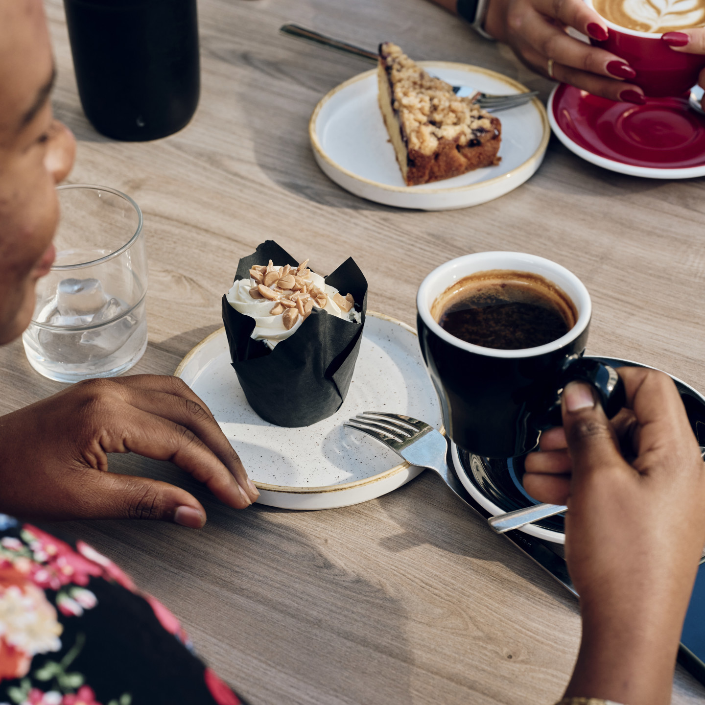 People having coffee and cake in Jersey Work Cafe